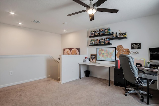 office featuring carpet flooring, a ceiling fan, baseboards, recessed lighting, and visible vents