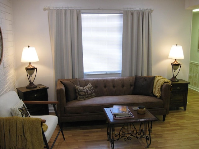 7026 Lenape Cir, New Port Richey, FL 34653 - living room with wood finished floors and baseboards