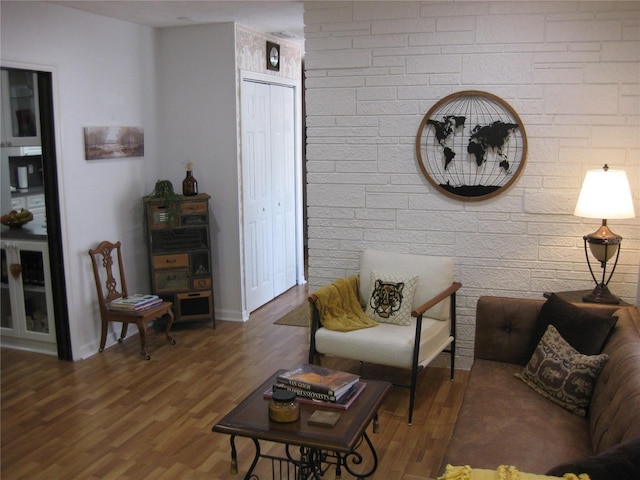 7026 Lenape Cir, New Port Richey, FL 34653 - living area featuring wood finished floors and baseboards