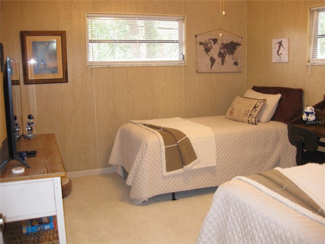 7026 Lenape Cir, New Port Richey, FL 34653 - carpeted bedroom featuring wood walls