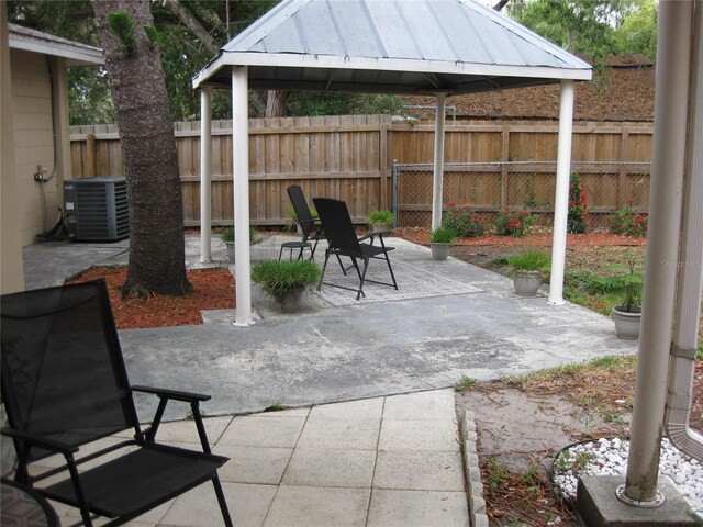 7026 Lenape Cir, New Port Richey, FL 34653 - view of patio / terrace with a gazebo