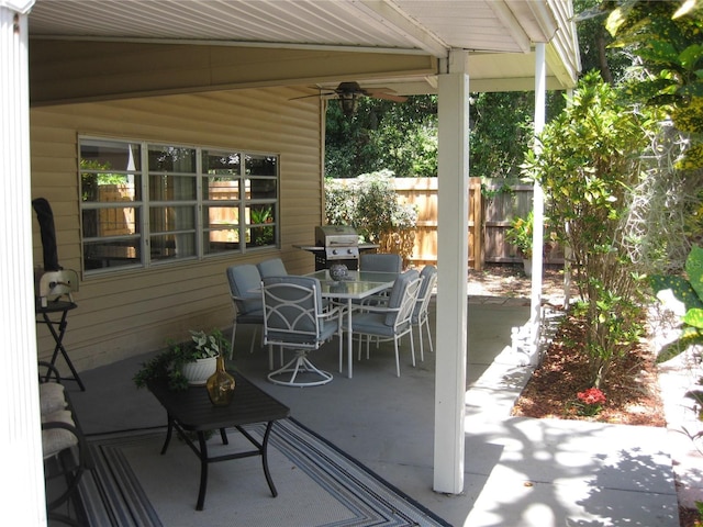 7026 Lenape Cir, New Port Richey, FL 34653 - view of patio / terrace featuring outdoor dining area and area for grilling