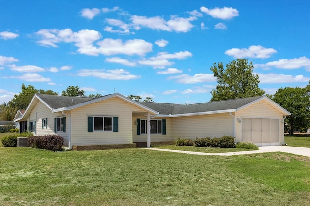 10980 SW 62nd Ave, Ocala, FL 34476 - single story home featuring concrete driveway, cooling unit, a front yard, and a garage