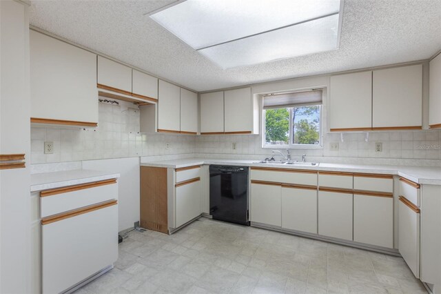 10980 SW 62nd Ave, Ocala, FL 34476 - kitchen featuring a sink, light floors, tasteful backsplash, and dishwasher