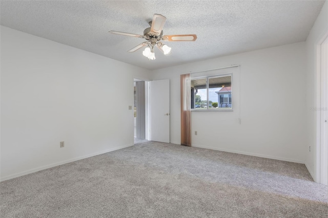 10980 SW 62nd Ave, Ocala, FL 34476 - unfurnished room featuring baseboards, a textured ceiling, carpet, and ceiling fan