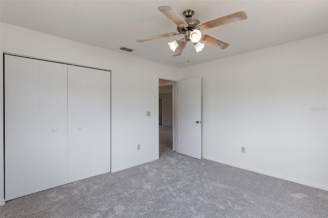 10980 SW 62nd Ave, Ocala, FL 34476 - unfurnished bedroom with a ceiling fan, visible vents, baseboards, a closet, and carpet