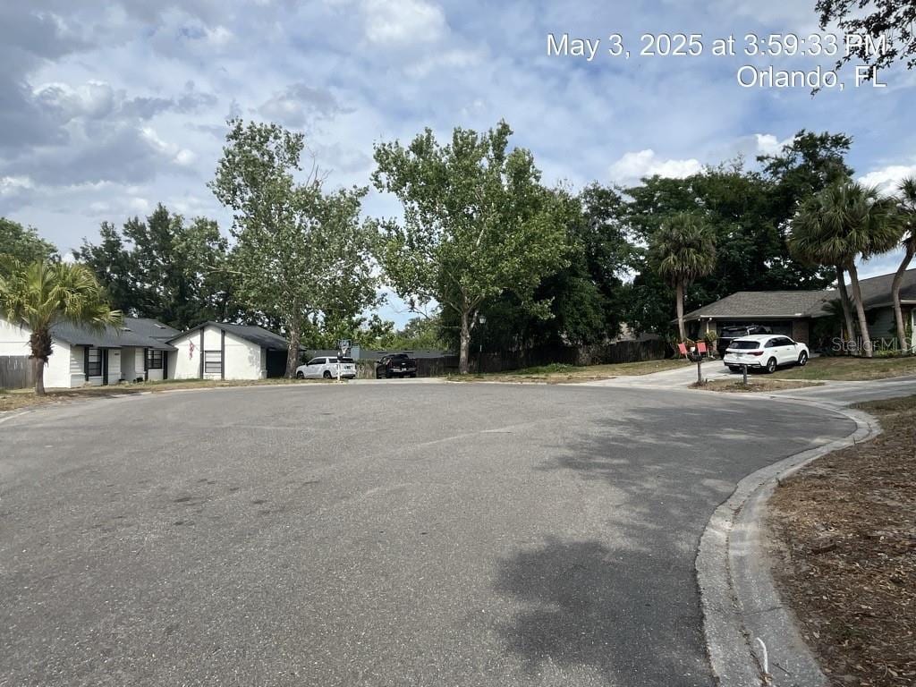 7614 Brisbane Ct, Orlando, FL 32835 - view of street with a residential view