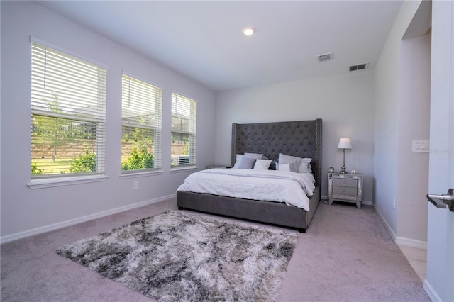 bedroom featuring visible vents and carpet