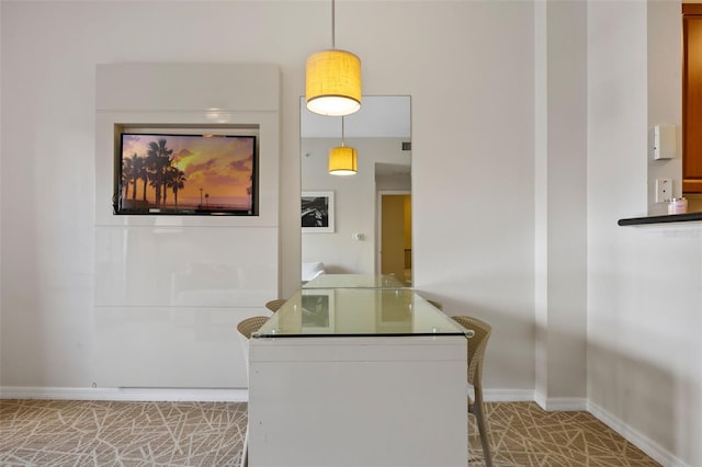 7395 Universal Blvd Unit 203, Orlando, FL 32819 - interior space with pendant lighting, baseboards, and dark countertops