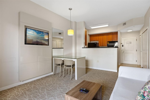 7395 Universal Blvd Unit 203, Orlando, FL 32819 - living area with baseboards and visible vents