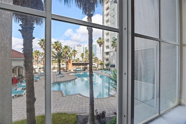 7395 Universal Blvd Unit 203, Orlando, FL 32819 - community pool with a patio