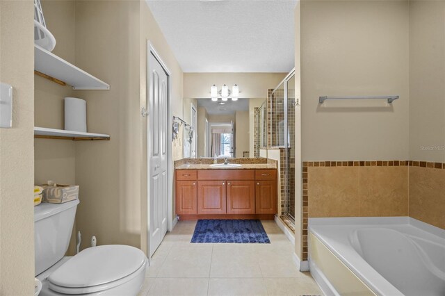 7395 Universal Blvd Unit 203, Orlando, FL 32819 - bathroom with toilet, a shower stall, tile patterned flooring, a garden tub, and vanity