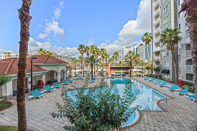 7395 Universal Blvd Unit 203, Orlando, FL 32819 - community pool with a patio