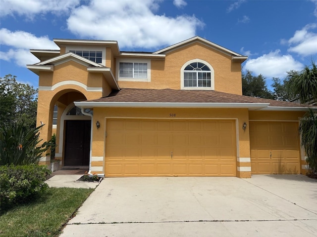 508 Royal Tree Ln, Oviedo, FL 32765 - view of front of house featuring stucco siding, concrete driveway, and a garage
