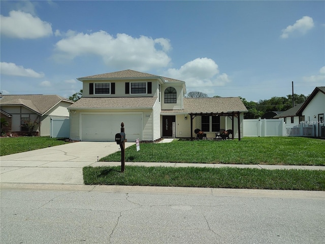 traditional-style house with a garage, a front lawn, fence, roof with shingles, and driveway
