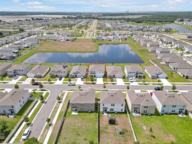 5289 Fiddle Fig Ave, Wimauma, FL 33598 - aerial view of residential area with a nearby body of water