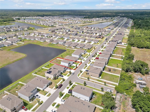 5289 Fiddle Fig Ave, Wimauma, FL 33598 - aerial view of residential area with a nearby body of water