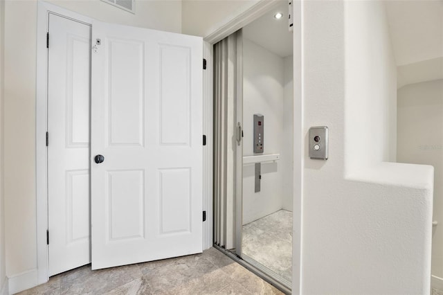 hallway with visible vents