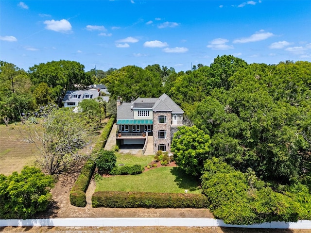 aerial view featuring a view of trees