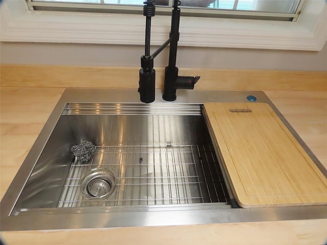 interior details featuring a sink