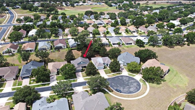aerial overview of property's location with nearby suburban area