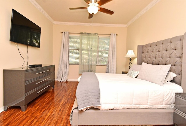 bedroom featuring dark wood finished floors, crown molding, baseboards, and ceiling fan