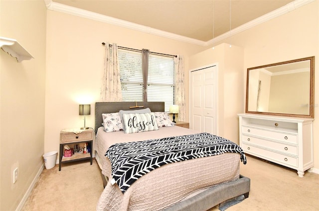 bedroom with light carpet, ornamental molding, a closet, and baseboards
