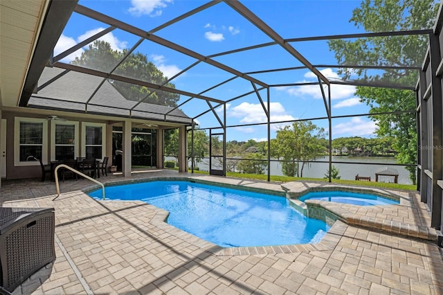 5108 Sailwind Cir, Orlando, FL 32810 - view of pool featuring ceiling fan, a water view, a patio, a pool with connected hot tub, and a lanai