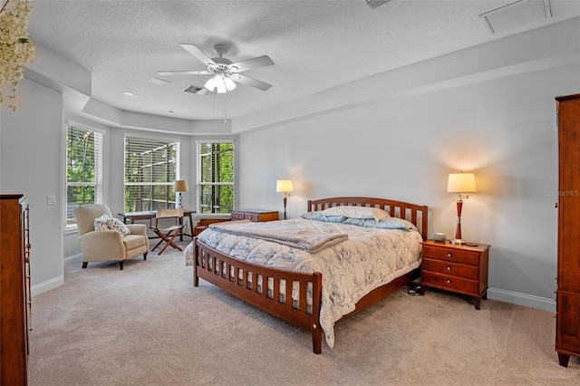 5108 Sailwind Cir, Orlando, FL 32810 - carpeted bedroom featuring a textured ceiling, baseboards, and a ceiling fan
