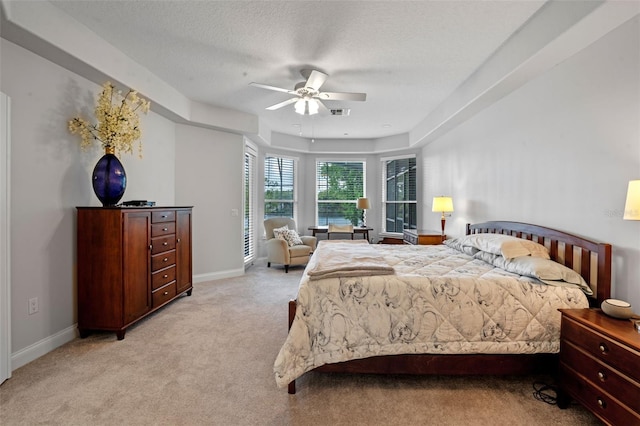 5108 Sailwind Cir, Orlando, FL 32810 - bedroom with light carpet, baseboards, a ceiling fan, a textured ceiling, and access to exterior