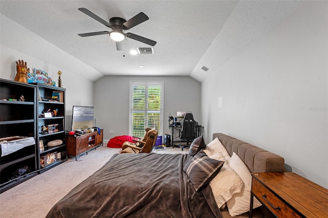 5108 Sailwind Cir, Orlando, FL 32810 - carpeted bedroom featuring lofted ceiling, a textured ceiling, and ceiling fan