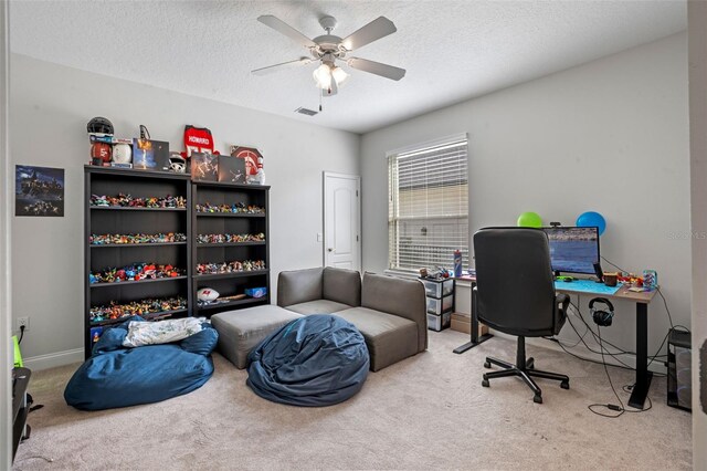 5108 Sailwind Cir, Orlando, FL 32810 - carpeted office with a ceiling fan, a textured ceiling, and baseboards