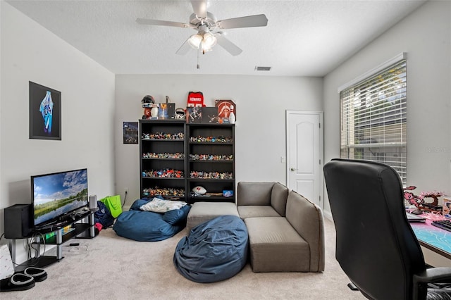 5108 Sailwind Cir, Orlando, FL 32810 - carpeted home office featuring ceiling fan and a textured ceiling