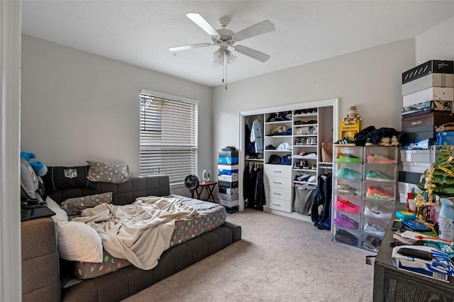 5108 Sailwind Cir, Orlando, FL 32810 - bedroom featuring carpet flooring, a closet, and ceiling fan