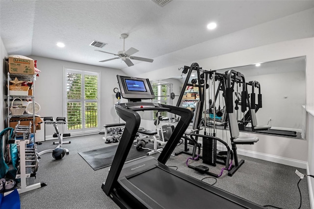 5108 Sailwind Cir, Orlando, FL 32810 - exercise room with lofted ceiling, a ceiling fan, baseboards, a textured ceiling, and recessed lighting