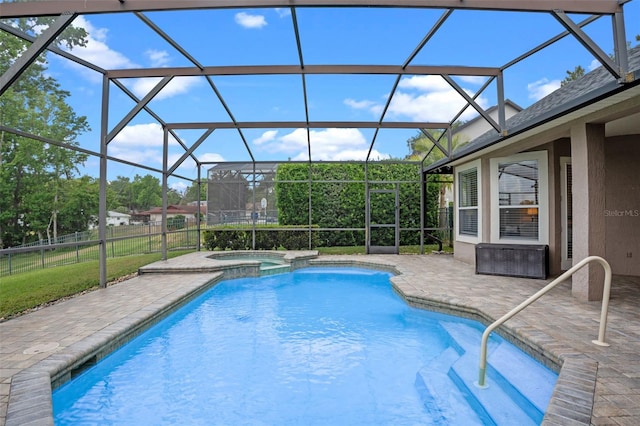 5108 Sailwind Cir, Orlando, FL 32810 - view of swimming pool with a patio, a pool with connected hot tub, and glass enclosure