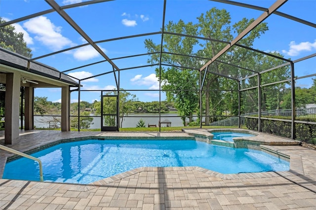 5108 Sailwind Cir, Orlando, FL 32810 - view of swimming pool with a patio area, a pool with connected hot tub, a lanai, and a water view