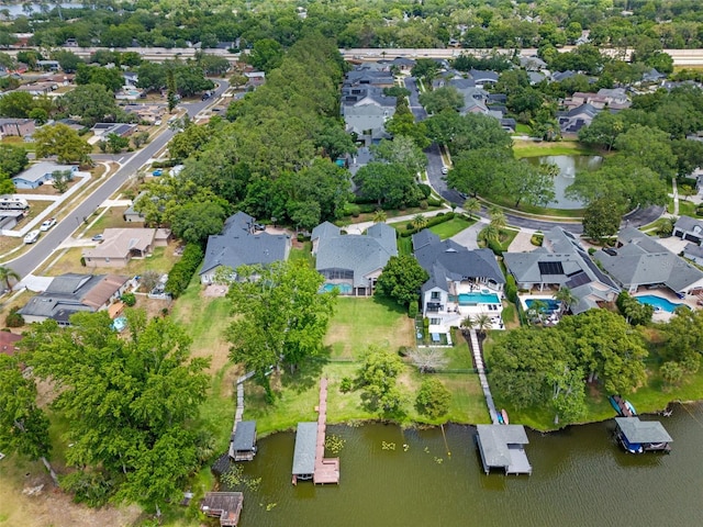 5108 Sailwind Cir, Orlando, FL 32810 - aerial view of property's location with nearby suburban area and a nearby body of water