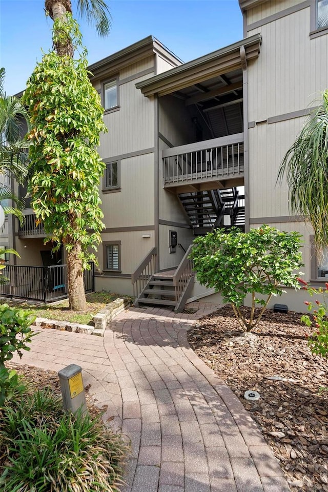 view of property with stairway