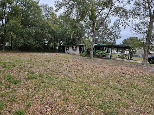 1424 Lake Shore Dr, Casselberry, FL 32707 - view of yard featuring a detached carport