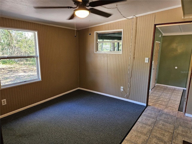 1424 Lake Shore Dr, Casselberry, FL 32707 - tiled spare room with ornamental molding, baseboards, and ceiling fan