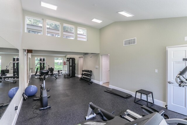 617 Red Oak Cir Unit 121, Altamonte Springs, FL 32701 - exercise room featuring high vaulted ceiling and baseboards