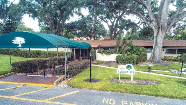617 Red Oak Cir Unit 121, Altamonte Springs, FL 32701 - surrounding community featuring a yard and uncovered parking