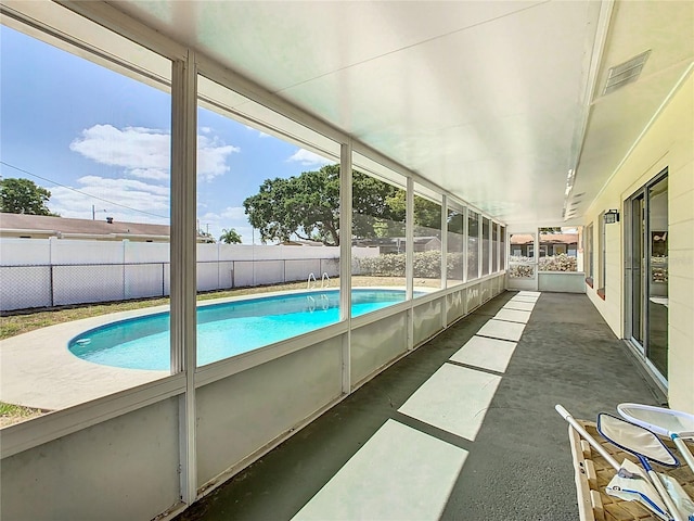 view of pool with a patio area, a fenced in pool, and fence