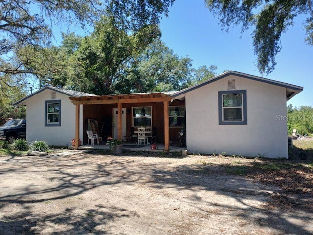 view of front of home featuring stucco siding