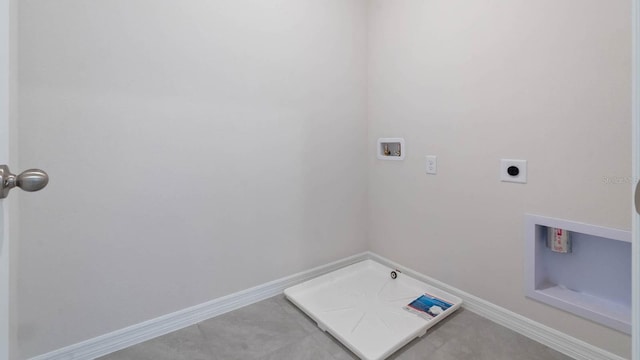 laundry room with laundry area, tile patterned flooring, electric dryer hookup, washer hookup, and baseboards