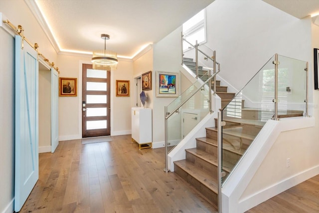 1831 Mizell Ave, Winter Park, FL 32789 - foyer with plenty of natural light, stairway, and wood finished floors