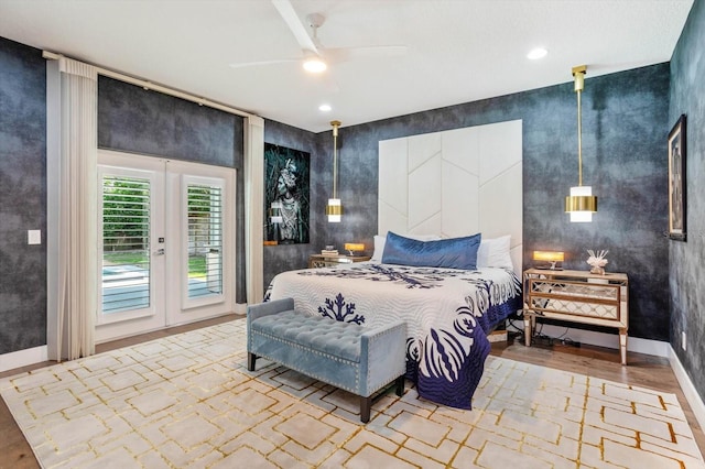 1831 Mizell Ave, Winter Park, FL 32789 - bedroom featuring access to exterior, wood finished floors, ceiling fan, french doors, and baseboards