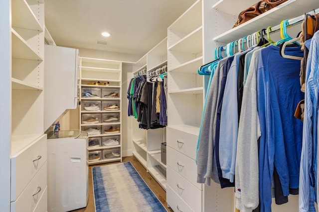 1831 Mizell Ave, Winter Park, FL 32789 - spacious closet featuring wood finished floors and washer / dryer