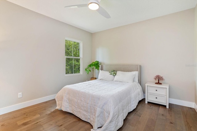 1831 Mizell Ave, Winter Park, FL 32789 - bedroom featuring baseboards, wood finished floors, and ceiling fan